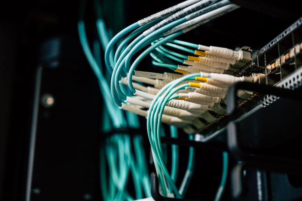 Network cables connecting equipment in a server rack.